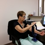 Carol using the Arm-Aid at Palermo to help loosen tight forearm muscles.