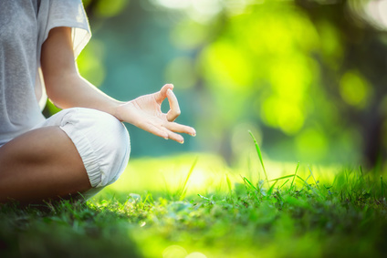 Meditating in nature, relaxation and stress-management strategies at Oakville Physiotherapy Clinic.