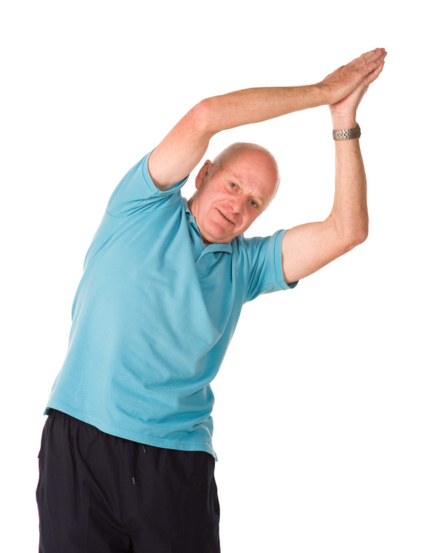 older man doing yoga at Palermo Physio in oakville